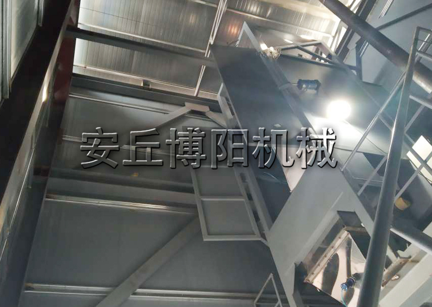 褚礦粉噸包拆包機可（kě）以搭配管鏈輸送機嗎？